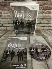 (3C-8303) The Beatles: Rock Band Nintendo Wii Video Game Complete Case Manual picture