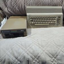 Commodore 64C Computer And Floppy- Good Condition picture
