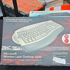 Microsoft Wireless Laser Desktop 6000 Ergonomic Combo QWERTY Silver 1000 DPI picture
