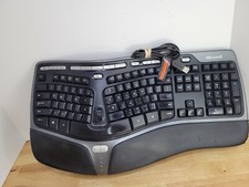 Microsoft Natural Ergonomic Curved Wired Keyboard 4000 Model KU-0462 with lift picture