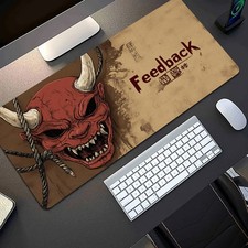 A Large Mouse Pad Featuring a Demon Mask And Japanese-Style Patterns, Designed picture
