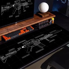 A Large Gaming Mouse Pad Featuring a Gun Blueprint Design, Ideal for Electroni picture