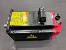 Fanuc A06B-0215-B200#0100 servo motor with A860-2000-T321 absolute encoder picture