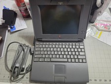 Apple PowerBook 540 w batteries, power supply, booklets. DOES NOT POWER ON picture