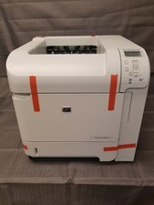 HP LASERJET P4014N - CB507A - DEALER RETURN - 1 YEAR WTY - NEW TONER - LOW PAGES picture
