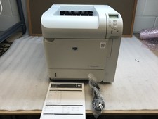 HP LaserJet P4014n Workgroup Monochrome Laser Printer 65k Pg Ct W/ toner picture