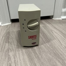 Belkin SlimSwitch 4-Port External Switch Model F1B028V picture