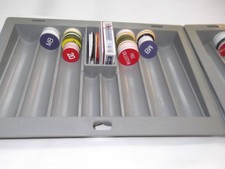 Dealer chip trays grey in color with gaming supplys.   buy one get one for free picture