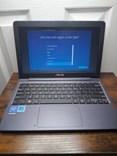 ASUS VivoBook E203M 11in Blue Intel Pentium 2GB eMMC HDMI Webcam +Charger picture