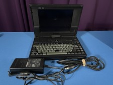 Grid 1660 Laptop & power cord- Powers On  WATCH VIDEO needs new hdd & battery picture