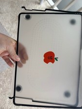 Casetify macbook pro 14 case, with the red apple in the middle, clear case. picture