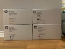 4 NEW Genuine HP Laserjet Print Cartridges - CF033AC, CF031AC, CE264XC, CF032AC picture