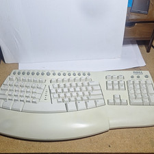 Dell Natural Keyboard Pro Ergonomic Wired Built-In USB Port Beige QWERTY English picture