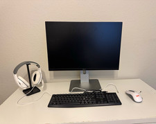 Computer accessory set. Comes with monitor, mouse, keyboard, and headset. picture
