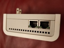 Netgear XE104 85 Mbps Wall-Plugged Ethernet Switch Plug Vintage picture