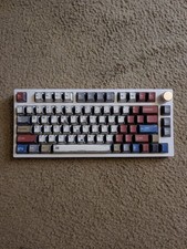 EPOMaker TH80 Pro with custom key caps and gold dial white picture
