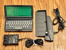 Hewlett Packard HP 320LX 4MB Palmtop PC VTG 1997 Win CE Handheld & Dock picture