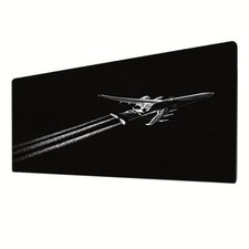 A Large Black Mouse Pad Featuring a Stylish White Airplane Design, with Sunlig picture