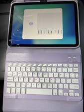 11 th generation iPad (a-16) with lavender case that has bluetooth keyboard picture